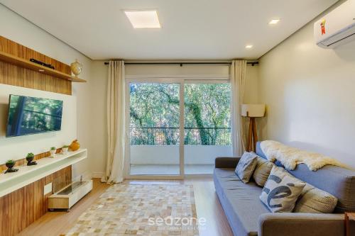 Μια τηλεόραση ή/και κέντρο ψυχαγωγίας στο Apto c/ 2 Quartos e Lareira - Canela EPE0304