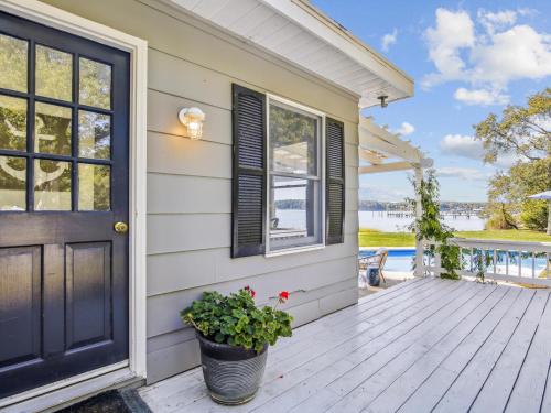 a front door of a house with a deck at Bankors Aweigh in Mount Pleasant