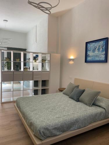 Postel nebo postele na pokoji v ubytování Casa vacanze La Casa di Leo