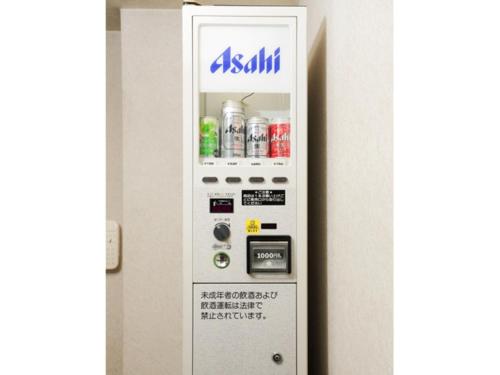 an asahi vending machine in a hotel room at Smile Hotel Yonago - Vacation STAY 97659v in Yonago
