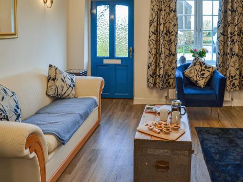 Et opholdsområde på Rosemary Cottage