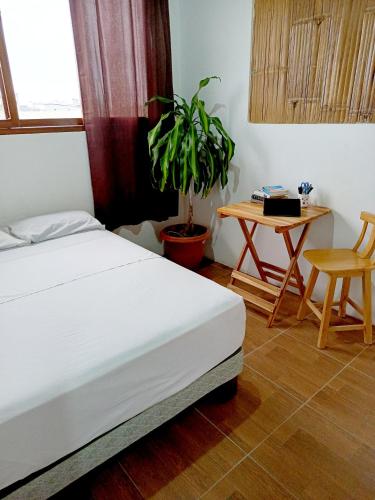Postel nebo postele na pokoji v ubytování Casa Mafer Lodge