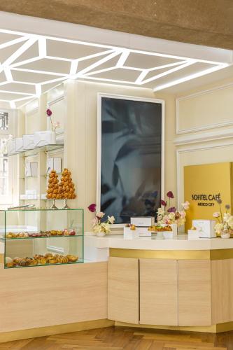 a room with a counter with pastries on display at Sofitel Mexico City Reforma in Mexico City