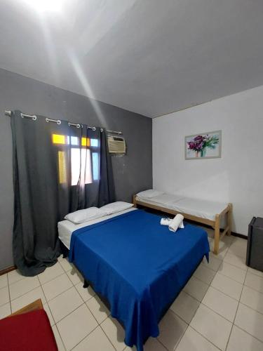Postel nebo postele na pokoji v ubytování Pousada MARIA BONITA