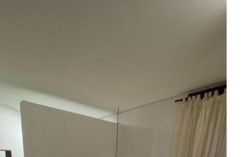 a bathroom with a mirror and a shower curtain at Pousada Luz do Porto in Porto De Galinhas