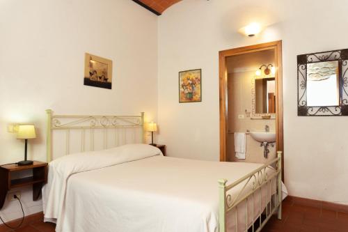 a bedroom with two beds and a sink at Filippo in Rapale