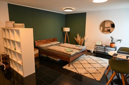 Ένα ή περισσότερα κρεβάτια σε δωμάτιο στο waldstudio Classy Apartment near Stuttgart