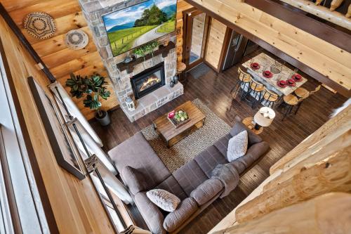 an overhead view of a living room with a fireplace at High Fa-Lootin by American Patriot Getaways in Oldham