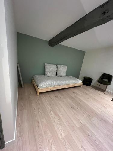 Ένα ή περισσότερα κρεβάτια σε δωμάτιο στο Appartement privé rose