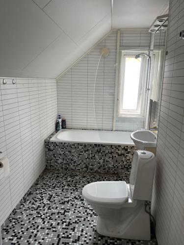 Bilik mandi di Loft apartment with 3 bedrooms