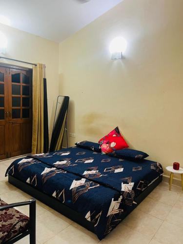 Postel nebo postele na pokoji v ubytování Harmony Retreat homestay