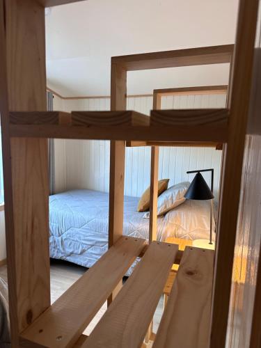 Postel nebo postele na pokoji v ubytování Refugio Ballena Hostel