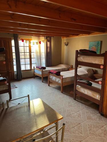 Postel nebo postele na pokoji v ubytování Antawara Hostel