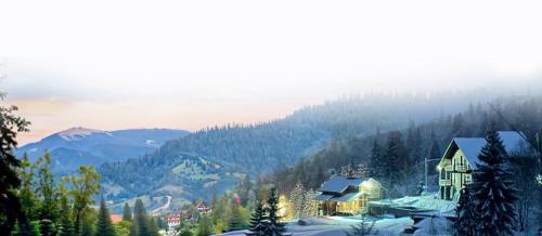 a ski lodge in the middle of a mountain at LAVANDA hotel club in Slavske