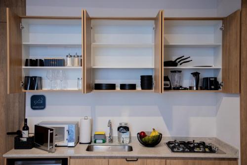 Luxury Penthouse Loft en Piso 29, Zona Norteにあるキッチンまたは簡易キッチン