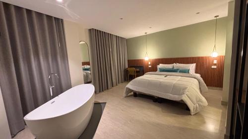 Postel nebo postele na pokoji v ubytování HOTEL COMFORT INN Torre B