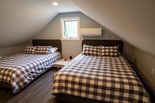 Cama o camas de una habitación en River Run Retreat