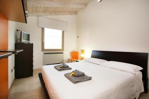 Ένα ή περισσότερα κρεβάτια σε δωμάτιο στο Isma Luxury Stay