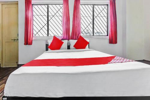 Hotel O Shree Balaji Lodgingにあるベッド