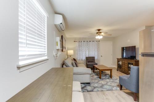 a living room with a couch and a table at Private Boat Slip Boaters Haven in Greers Ferry! in Greers Ferry