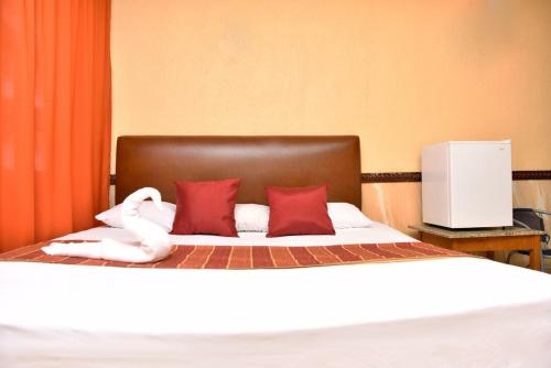 Ein Bett oder Betten in einem Zimmer der Unterkunft Hotel Marina Centro