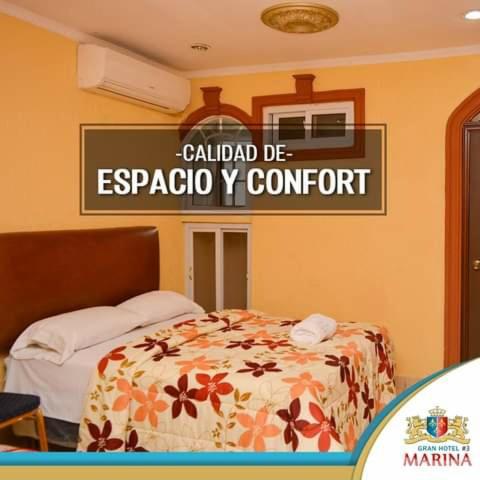 Ein Bett oder Betten in einem Zimmer der Unterkunft Hotel Marina Centro