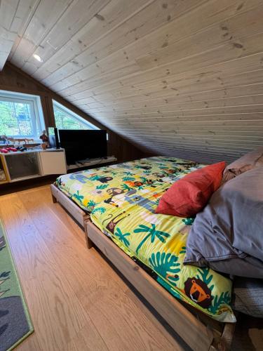 a bedroom with a bed in a room at Sunny Side in Hvaler