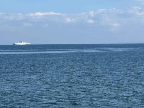 a boat in the middle of the ocean at Modern Oasis in Marielyst - By Traum Ferienwohnungen in Marielyst