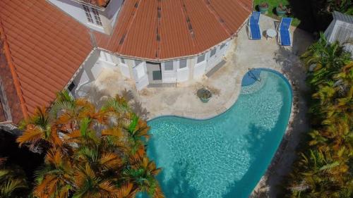 an aerial view of a house with a swimming pool at ZenBreak Marzalea Villa 2bd in Saint James