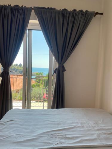 Postel nebo postele na pokoji v ubytování Sun & Sea