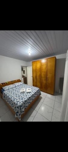 Katil atau katil-katil dalam bilik di Apartamento Varandas 2