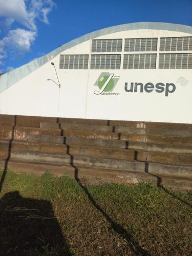 a building with a bunch of stairs in front at Cantar do passaro in Jaboticabal