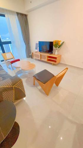 Ruang duduk di Golden New Nest INN 金巢新旅居!!near THE Exchange TRX & Bukit Bintang & Pavilion & Suria KLCC!!Agile luxury suites