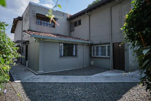 a building with its doors open at Apartahotel Poblado-Aguacatala in Envigado