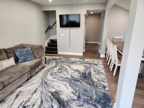 a living room with a couch and a tv at NWW single 2nd ave Hereford Inlet Anglesea in North Wildwood