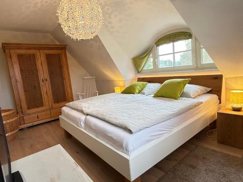 Postel nebo postele na pokoji v ubytování Haus Windflüchter