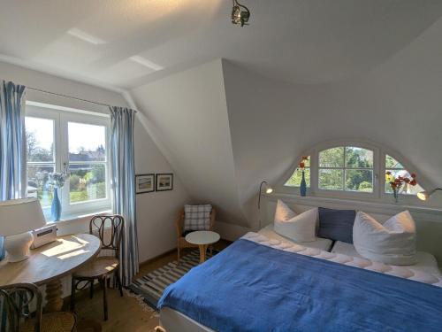 Giường trong phòng chung tại Haus Wikinger