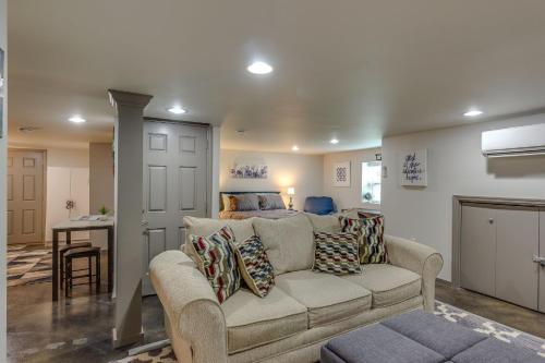a living room with a couch and a bed at Downtown in Minutes Nashville Sweet Retreat in Nashville