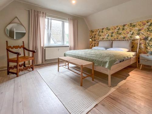 En eller flere senge i et værelse på Haus Sommerfreuden