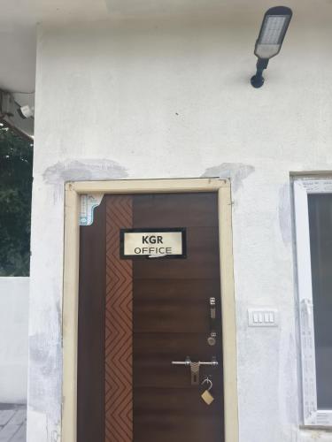 a door with a key office sign on it at Kurinjchi Garden Resort - Yelagiri Hills in Yelagiri