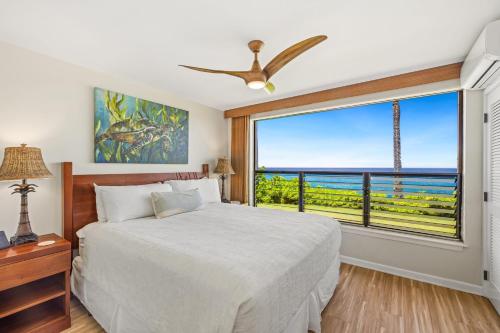 Postel nebo postele na pokoji v ubytování Poipu Shores 102A