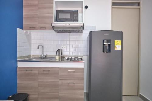 Kuchyň nebo kuchyňský kout v ubytování Apartamentos y Loft en Zona Rosa de Laureles