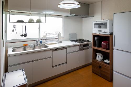 Køkken eller tekøkken på White Dream Lodge Furano