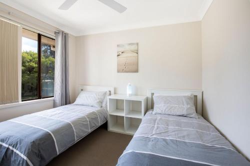 Katil atau katil-katil dalam bilik di Sunsets - Family Friendly, Affordable