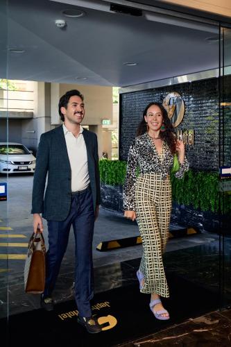 a man and a woman standing next to each other at Jephson Hotel & Apartments in Brisbane