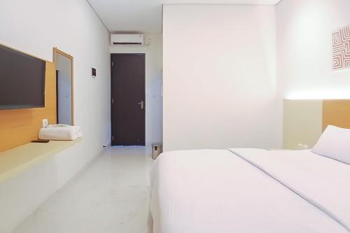 Кровать или кровати в номере Happy Living Syariah near Stasiun Klaten Mitra RedDoorz