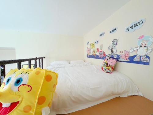 Katil atau katil-katil dalam bilik di Weizhou Island Sunny Xixia Seaside Boutique Inn