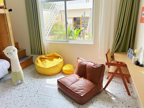 Ruang duduk di Weizhou Island Sunny Xixia Seaside Boutique Inn
