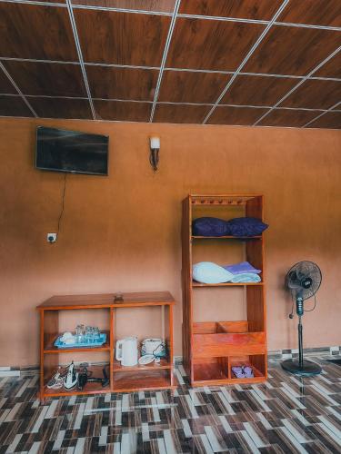 two bunk beds in a room with a tv at View Paradise in Ella