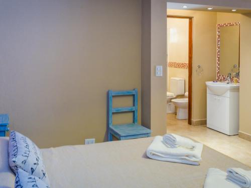 Tierra Virgen Apartments tesisinde bir odada yatak veya yataklar